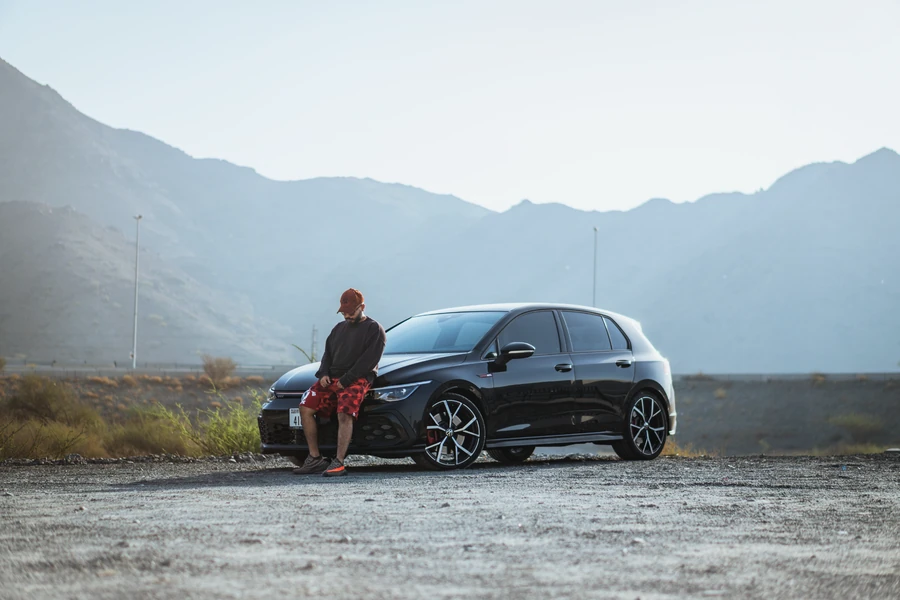 A quiet stop beside a car in the mountains